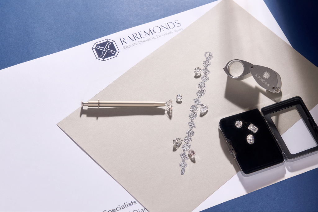 A grayscale image depicting a jewelry design layout with tools.